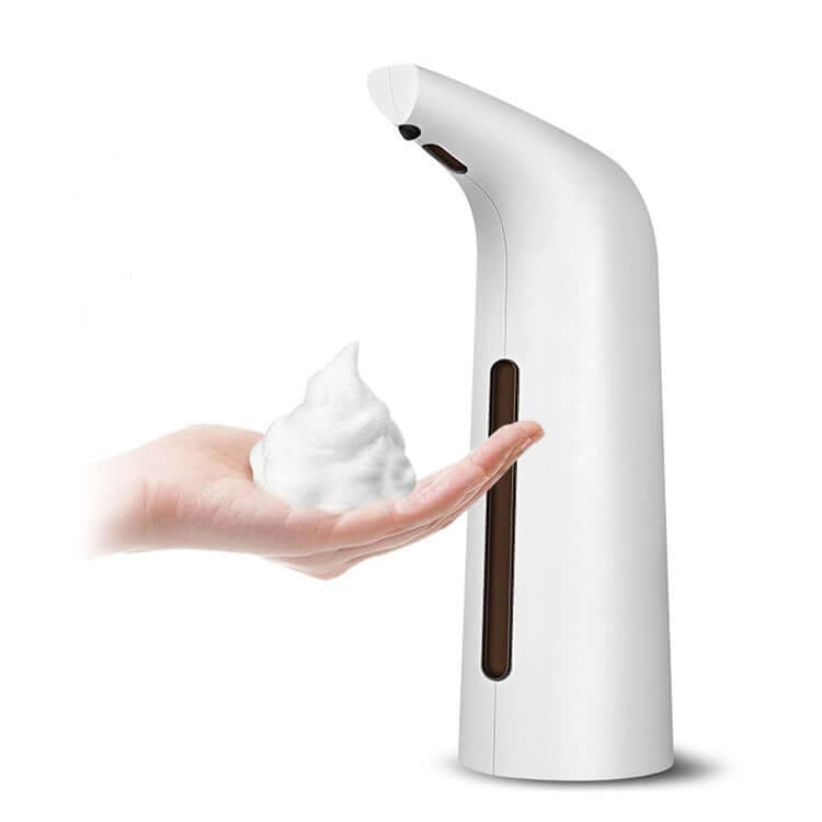 Touchless automatic induction liquid dispenser dispensing foam into a hand, showcasing modern design and sanitation features.